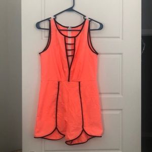 Large coral jumper. Smaller fit.